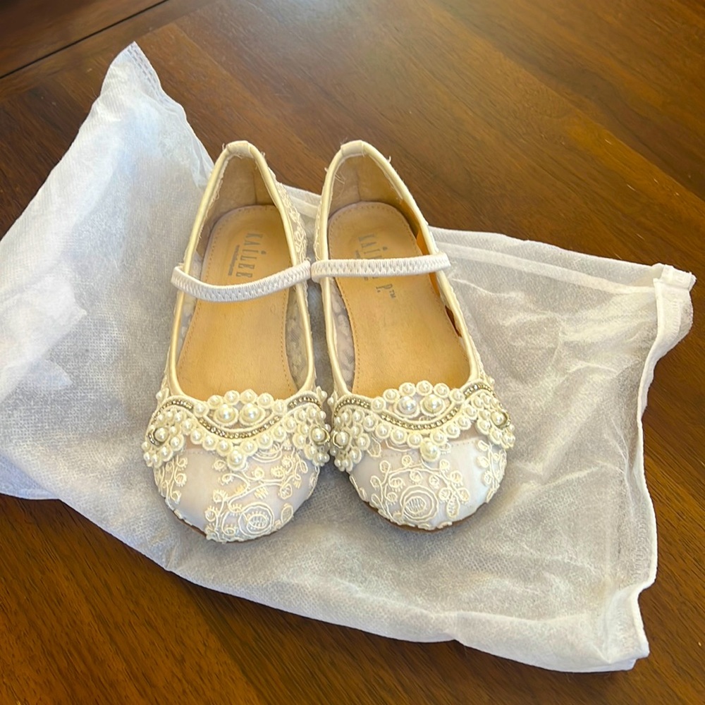 Custom ordered dress shoes in cream for a wedding. Worn once.
